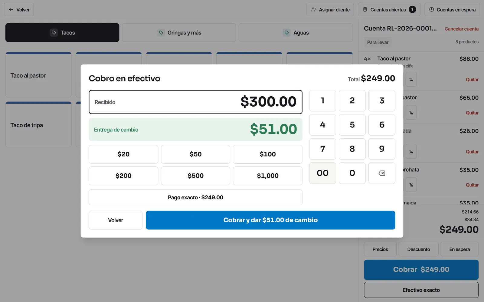 El cobro en efectivo con el cambio calculado.